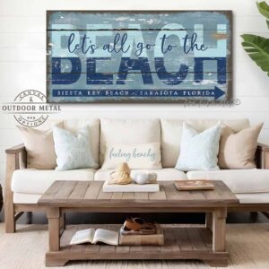 ToeFishArt Let's All Go to the Beach Outdoor Metal or Canvas Personalize-able rustic coastal farmhouse sign, in beautiful vintage beach cottage ocean blues and nautical navy blue, handmade by ToeFishArt. Outdoor Exterior Commercial-Grade durable Metal Sign handmade in the USA and built to last a lifetime by the Toe Fish Art family artisans. Add your custom Beach Name and City, State to this beautiful blue and white artwork for unique eye-catching decor indoors or outdoor curb appeal. Original, custom, personalized wall decor signs. Canvas, Wood or Metal. Rustic modern farmhouse, cottagecore, vintage, retro, industrial, Americana, primitive, country, coastal, minimalist.